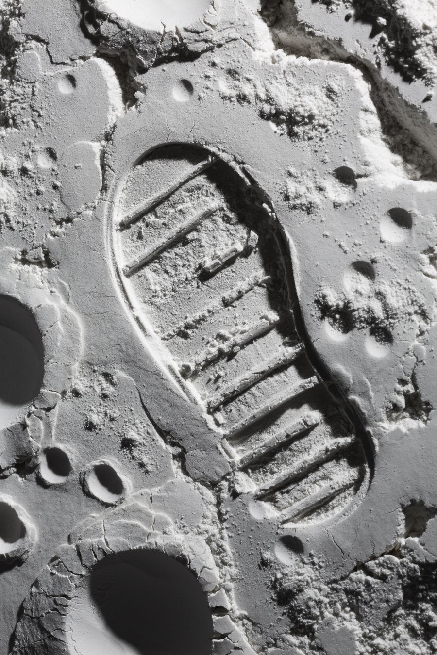 Bootprint pressed into lunar soil